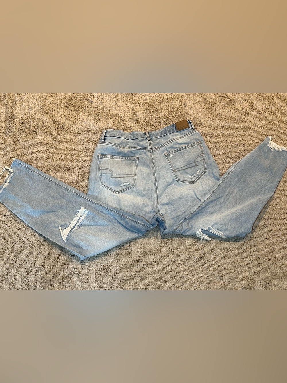 American Eagle Outfitters Light Blue High-Rise Distressed Ankle Jeans